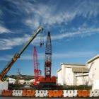 Cranes occupy the site of the Forsyth Barr Stadium in Awatea St, Dunedin, in this composite...