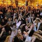 Crowds in Dunedin's Octagon watch the All Black-France final last month.  Rugby World Cup...