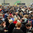 Crowds mingle and munch during the 2013 Port Chalmers Seafood Festival.