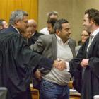 Crown counsel Robin Bates (left), of Dunedin, shakes hands with defence counsel Matthew Karam...
