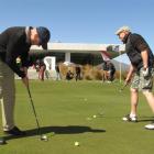 Cure Kids supporters Jim Moore, of Queenstown, (left) and Peugeot New Zealand representative...