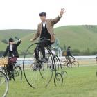 Cyclists Vanessa and Greg Davies wave to the crowd at Oamaru racecourse for the Heritage Raceday...