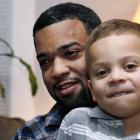 Damon Brown sits with his son Julian, 5, at their home in Seattle. Damon found a kidney on...
