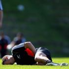 Dan Carter feels the pain after sustaining a groin injury during an All Black captain's run at...