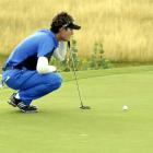 Danny Lee, of New Zealand, sizes up a putt on the first green yesterday. Photo by Gregor Richardson.