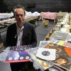 Darryl Baser looks for musical treasures among the hundreds of vinyl records awaiting the crowds...