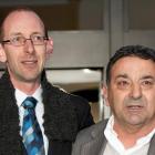 David Bain, left and his supporter Joe Karam emerge from the High Court after Bain was found not...