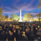 Dawn breaks over the cenotaph in Dunedin as a large crowd commemorates Anzac Day. Photo: Gerard O...