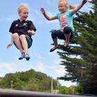 Deakin (7) and Jordin (5) Eckhoff enjoy a bounce on the Dunedin Hoiliday park trampoline...