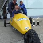 Deane and Laura Preston prepare to give trolley driver Natalie Preston a helping hand in the ...