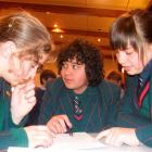 Debating the correct answer is the Mountainview High School team of (from left) Keeley Armstrong ...