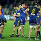 Dejected Otago players on the field following their 41-0 loss to Hawkes Bay in Napier on Sunday. ...