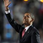 Democratic presidential candidate Barack Obama waves to the crowd as he prepares to address the...