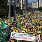 Demonstrators attend a protest in Sao Paulo's financial centre against Brazil's President Dilma...