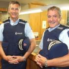 Deputy police commissioner Mike Bush (left) and Southern District police superintendent Bob Burns...