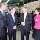 Deputy prime minister Bill English chats with (from left) Fonterra southern operations manager...