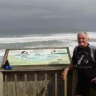 Des Lehndorf and his mascot, Tiri, at Te Waewae Bay, Southland, last weekend, after completing a...