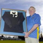 Former New Zealand Rugby Football Union president Dave Johnston shows off Peter Johnstone's All...