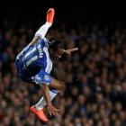 Didier Drogba of Chelsea falls after jumping for a header during their Champions League semi...