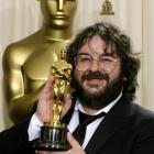 Director Peter Jackson holds his Oscar for best adapted screenplay for The Lord of the Rings:The...