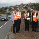 Discussing the improvements to the Caversham highway are (from left) Opus International project...