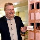 Distinction Dunedin Hotel general manager Andrew Duncan with a mystery telegram found in a wall...