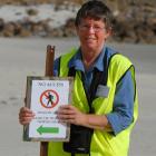 Doc volunteer warden Pat Dean believes there is still room to improve signs. Photo by Gregor...