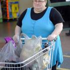 Donna Courtney has changed her shopping and eating habits due to increasing food prices. Photo by...