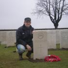 Dr Andrew Macdonald at the reburied remains of a New Zealand soldier at Messines, in Belgium, not...