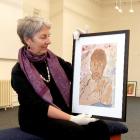Dr Barabara Piscitelli, of Brosbane, prepares a self-portrait of Macandrew Bay School pupil Jakob...