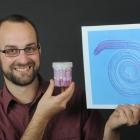 Dr Daniel Leduc, a University of Otago postdoctoral researcher, holds nematode worm samples from...