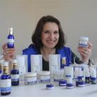 Dr Fernanda da Silva Tatley with some of her Azurlis skin-care products. Photo by Peter McIntosh.