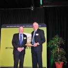 Dr George Davis (right) receives the Silver Fern Farms sheep industry science award from Silver...