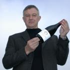 Dr Jim Jerram in 2007 with Ostler Vineyard's first pinot noir, from its vineyard in the lower...