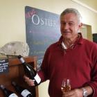 Dr Jim Jerram with a bottle of Ostler Audrey's Pinot Gris, which has received high praise from...