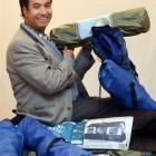 Dr Niranjan Sharma with some of the tents he hopes will provide shelter for Nepalese citizens...