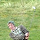 Duncan Croudis blasts out of a bunker during the Chisholm Park 36 Hole Open Tournament on Sunday....