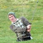 Duncan Croudis plays out of a bunker during the Chisholm Park 36-hole open tournament in...