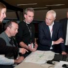 Dunedin architectural designer Gary Todd (centre) discusses rebuild ideas for Cathedral Sq with ...