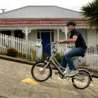 Dunedin AvantiPlus bike mechanic Mac Robertson tests the eZee electric bike up Baldwin St in...