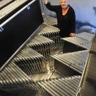Dunedin City Council events team leader Marilyn Anderson with a batch of new barrier fences which...