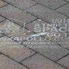 Dunedin City Council has ordered the removal of these signs sprayed on to footpaths around...