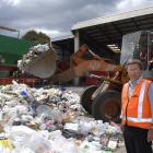 Dunedin City Council Water and Waste Services solid waste manager, Ian Featherston, with some of...