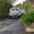 Dunedin city councillor John Bezett's Toyota RAV4 blocks the vehicles of Steve and Lorraine...
