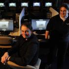 Dunedin CueClub director Mark Peisker and Inga Ford, in the company's internet cafe. Photo by...