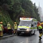Dunedin emergency services attend a car roll-over in Pitt St about 11.20am yesterday. Photo by...