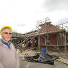 Dunedin Gasworks Museum Trust Board member John Heaven is pleased by the progress of restoration...