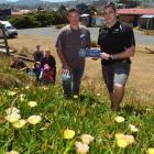 Dunedin Holiday Park manager Daniel Grubb (right) receives a Keep Dunedin Beautiful supreme award...