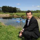 Dunedin International Airport operations manager Richard Roberts at the effluent pond on the...