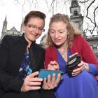 Dunedin lawyers Jackie St John (left) and Rachel Brooking test the Octagon's new gigabit Wi-Fi...